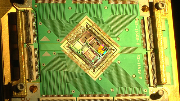The D-Wave Vesuvius chip that lies at the heart of its 2X quantum computer, on show at NASA's Advanced Supercomputer Facility in Silicon Valley on Dec. 8, 2015.